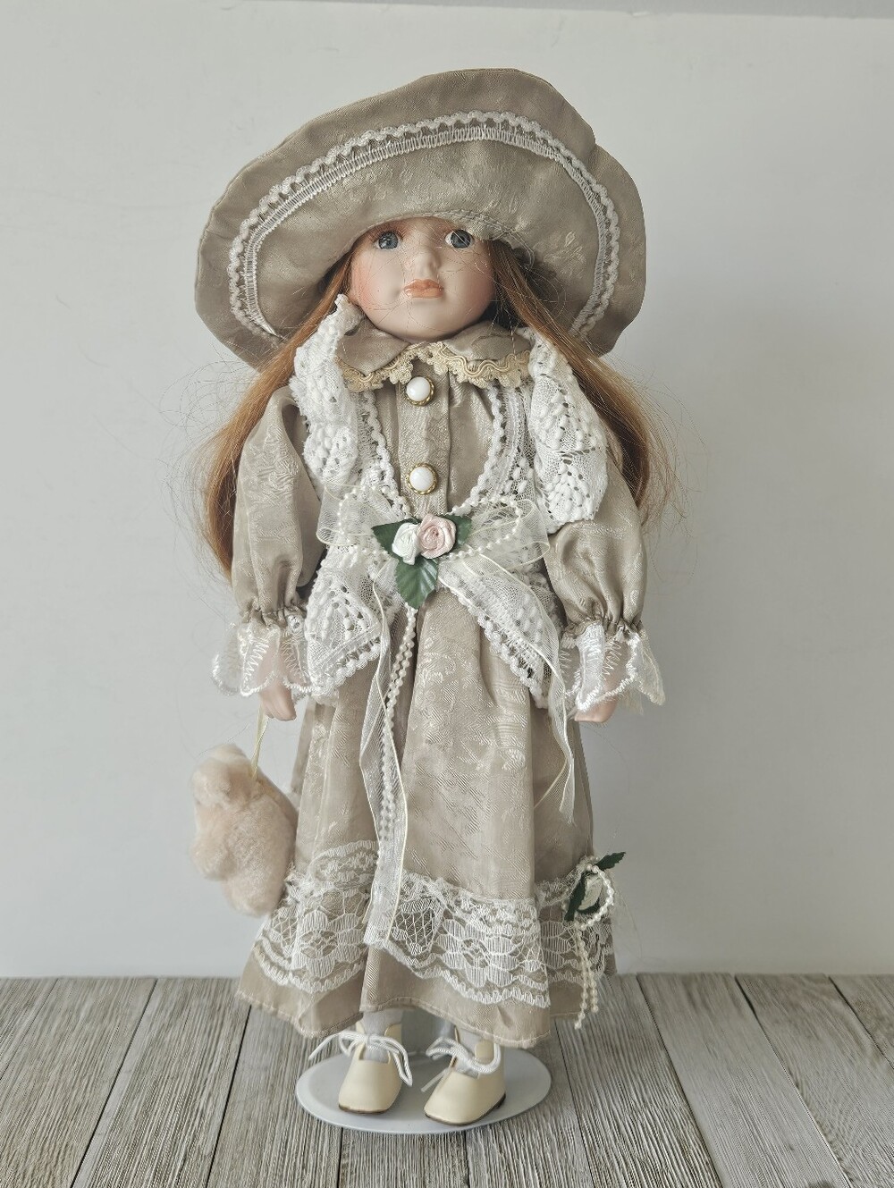 Vintage 16" Porcelain Doll Wearing Beige Floral Lace Dress and Hat Holding A Ted